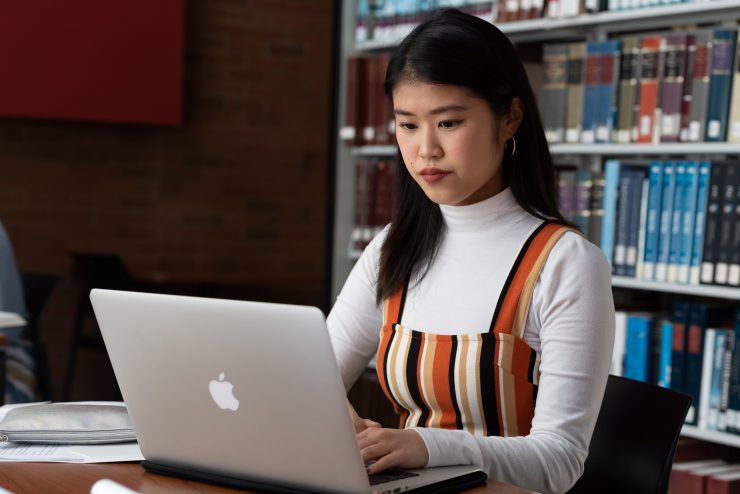 A student studying in the library