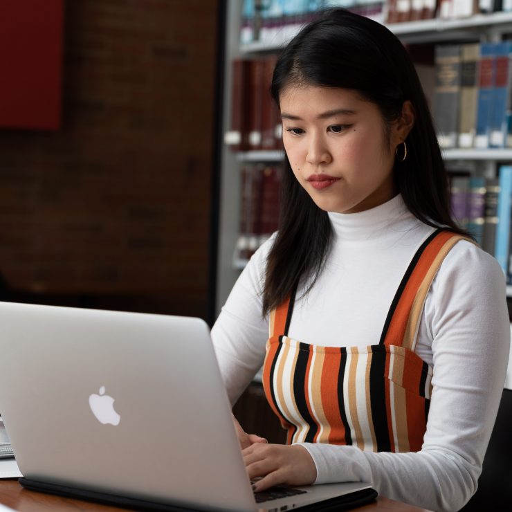 A student studying in the library