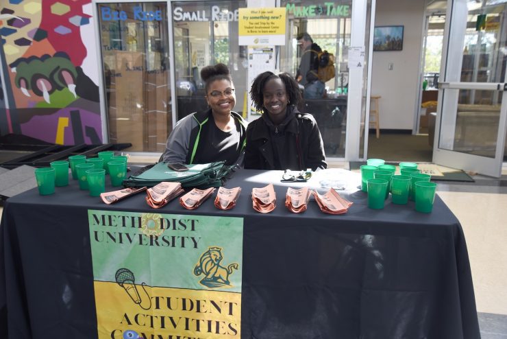 Methodist University students recruiting at an organization fair at Berns Student Center