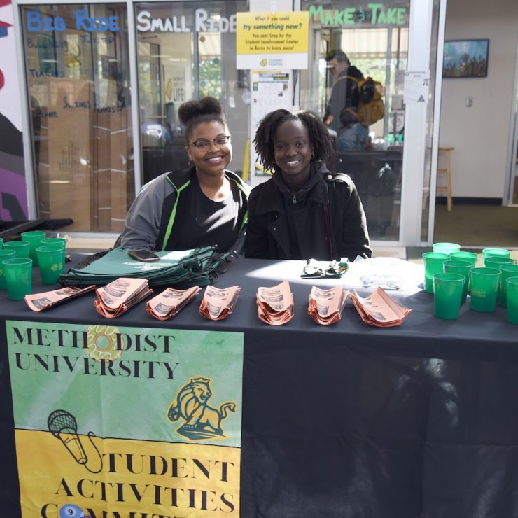 Methodist University students recruiting at an organization fair at Berns Student Center