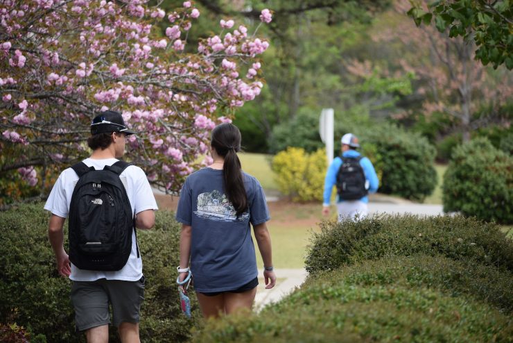 Methodist University students walking on campus
