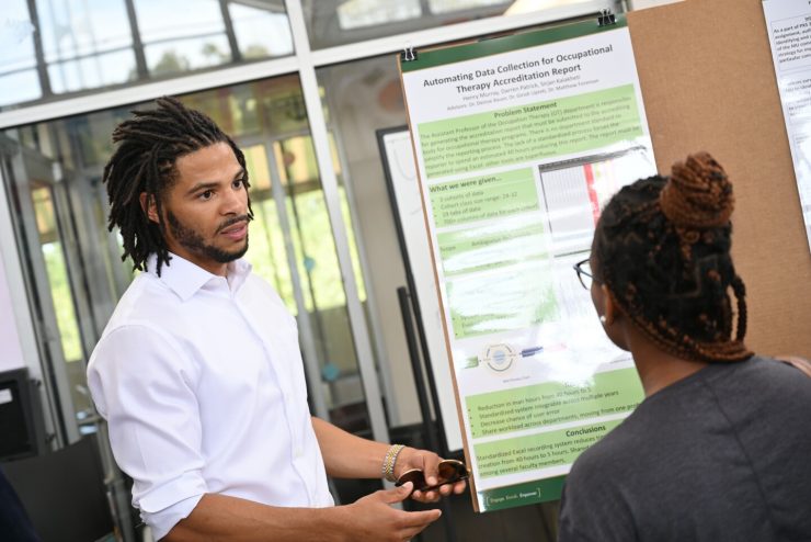 A student presents at the annual Center for Research & Creativity Symposium