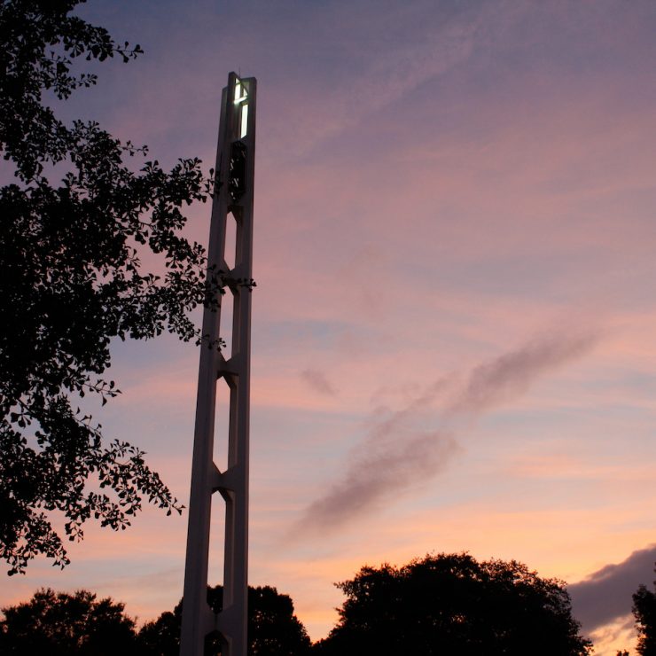 Methodist University bell tower with night sky