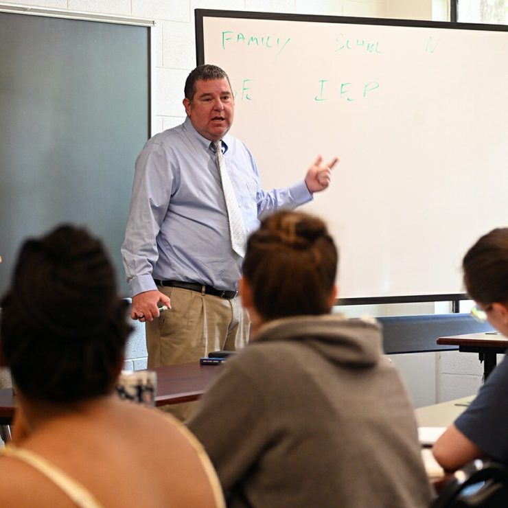 Dr. Eric See teaches a Criminal Justice class