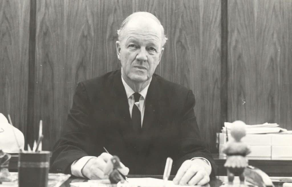 A circa 1960 photo of Dr. L. Stacy Weaver at his desk.