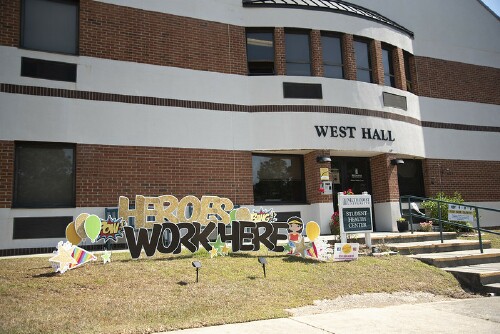 "Heroes Work Here" sign outside the Methodist University Health Center in West Hall