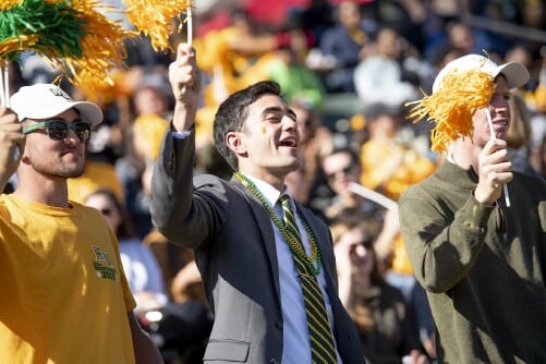 Methodist University fans cheer at a homecoming game