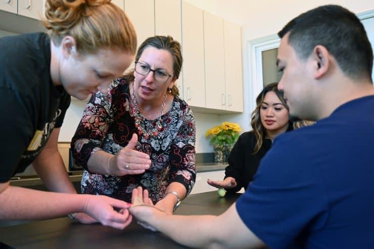 Dr. Amy Haynes teaches a Doctor of Occupational Therapy class at Methodist University