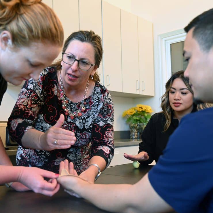 Dr. Amy Haynes teaches a Doctor of Occupational Therapy class at Methodist University