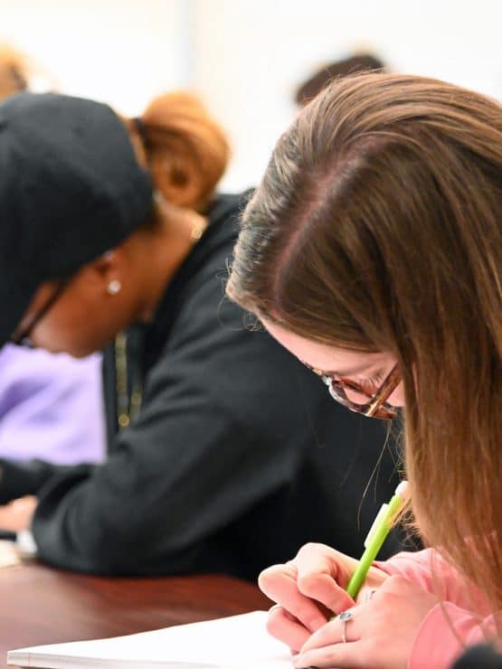 Students taking notes at Methodist University