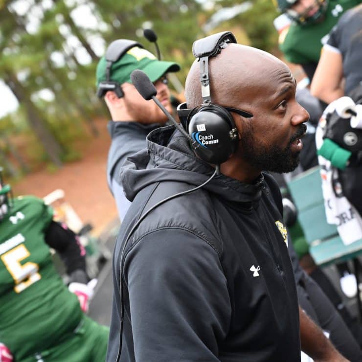 Methodist University football coach on the sideline