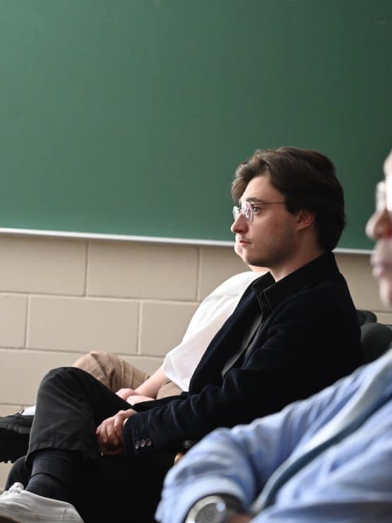 Methodist University students and faculty listen to presentation