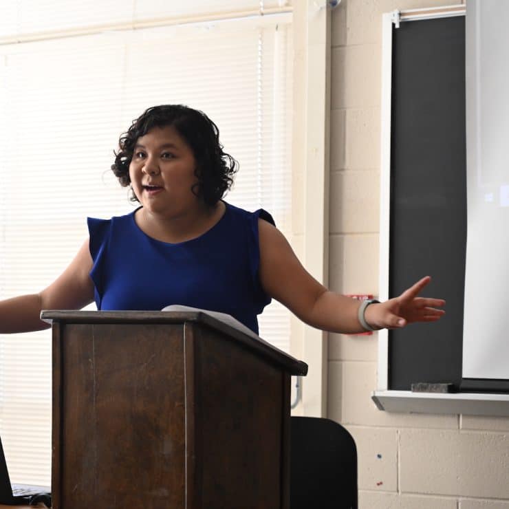 Methodist University students presents in classroom