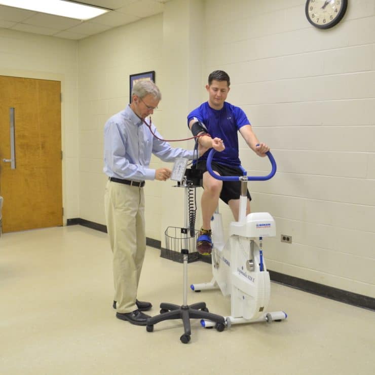 Kinesiology professor instructs student at Methodist University