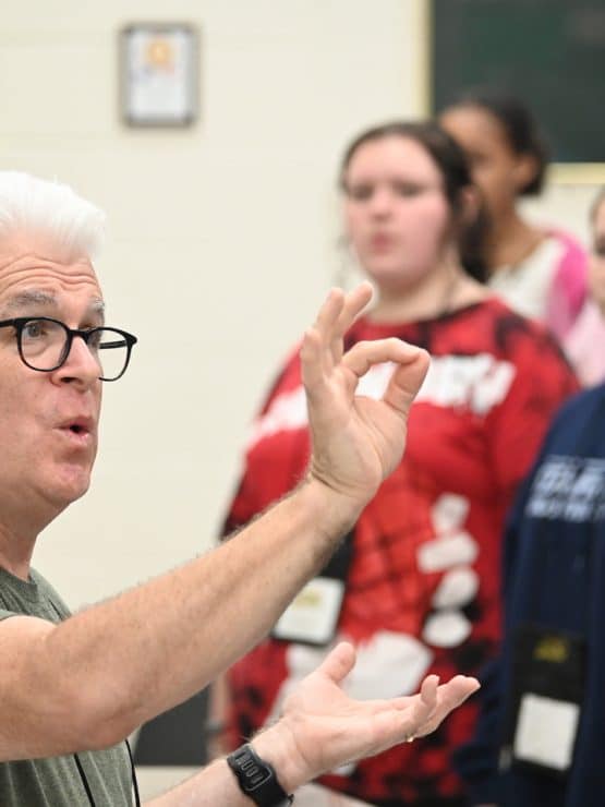Michael Martin teaching chorus at Methodist University