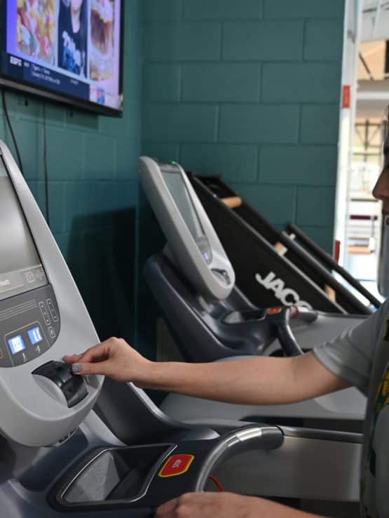 Methodist University student working out in Nimocks Fitness Center