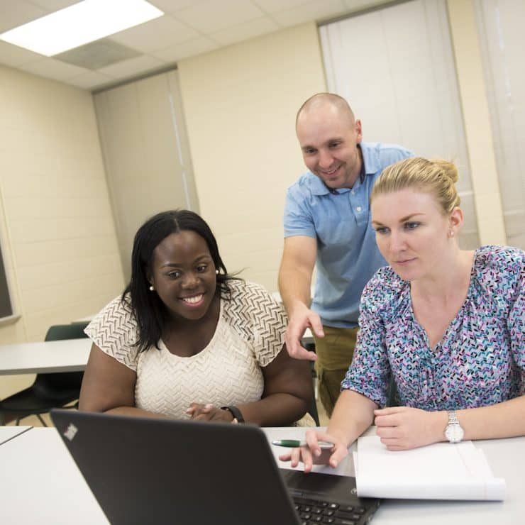 Methodist University instructor teaching students in classroom