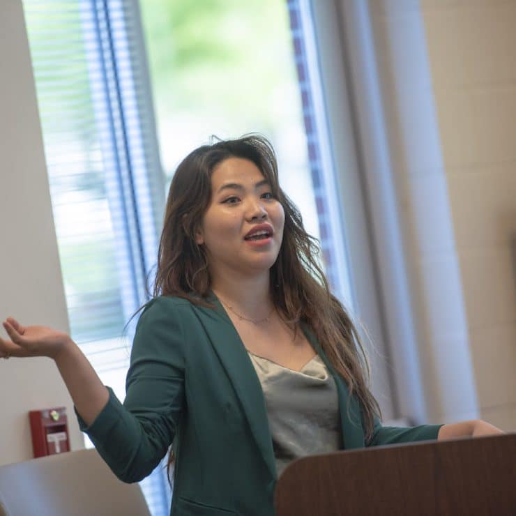 Woman gives presentation at Methodist University