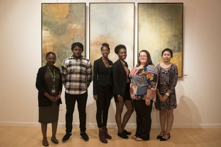 Student docents at the Elemental exhibition