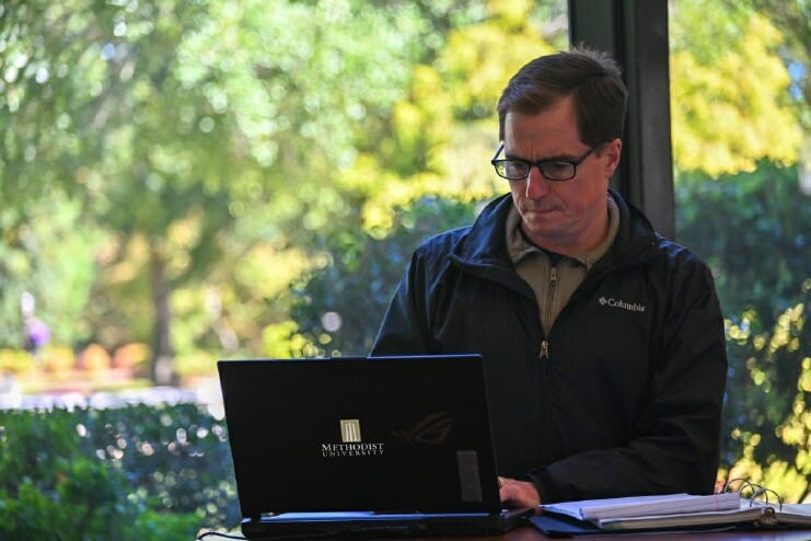 Methodist University senior Mathew Malone, a U.S. military veteran, studies for one of his Business Administration classes at Davis Memorial Library.