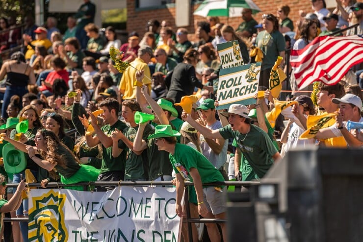 Methodist University’s rowdy student section displays their green and gold pride during the football team’s game against Huntingdon.