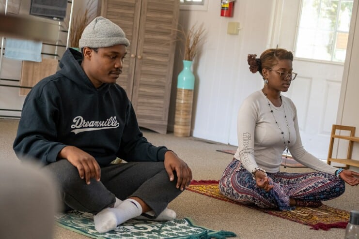 Methodist University students Mlandvo Maphalala (left) and Gabby Moyo (right) relax during their yoga session at the University's Still Point room.