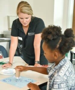 An Occupational Therapy Student works with a child