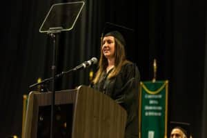 Distinguished graduate Jillian Drinkard, who received her Bachelor of Science in Business Administration, delivers a message to her fellow graduates.