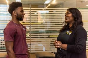 A student meets with Academic & Career Advisor Kadejah Horne