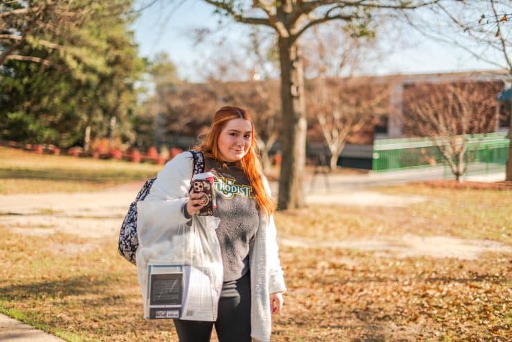 Methodist University student walking to class