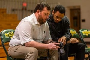 Sports Information Director Michael Spratt and student employee Wade Jackson