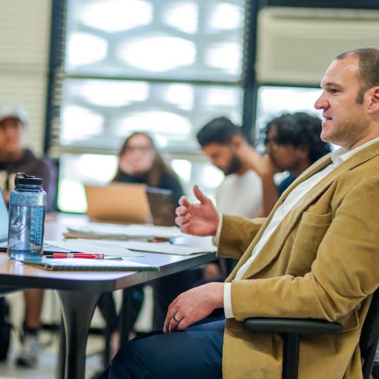 Dr. Cameron Dodworth teaches an English class at Methodist University