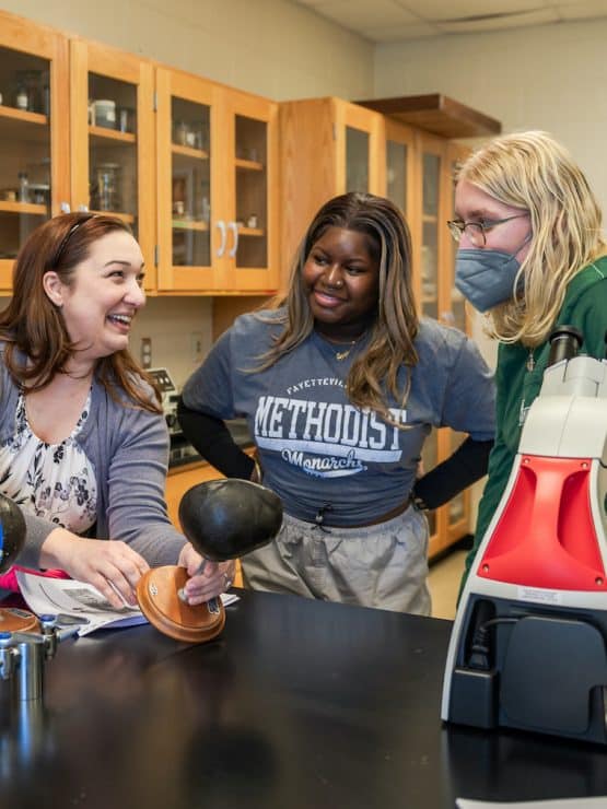 Methodist University Biology professor instructs students during class.