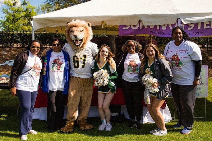 King and MU Cheerleaders with Health & Wellness Expo participants