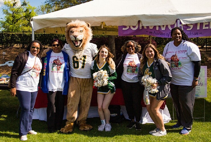 King and MU Cheerleaders with Health & Wellness Expo participants
