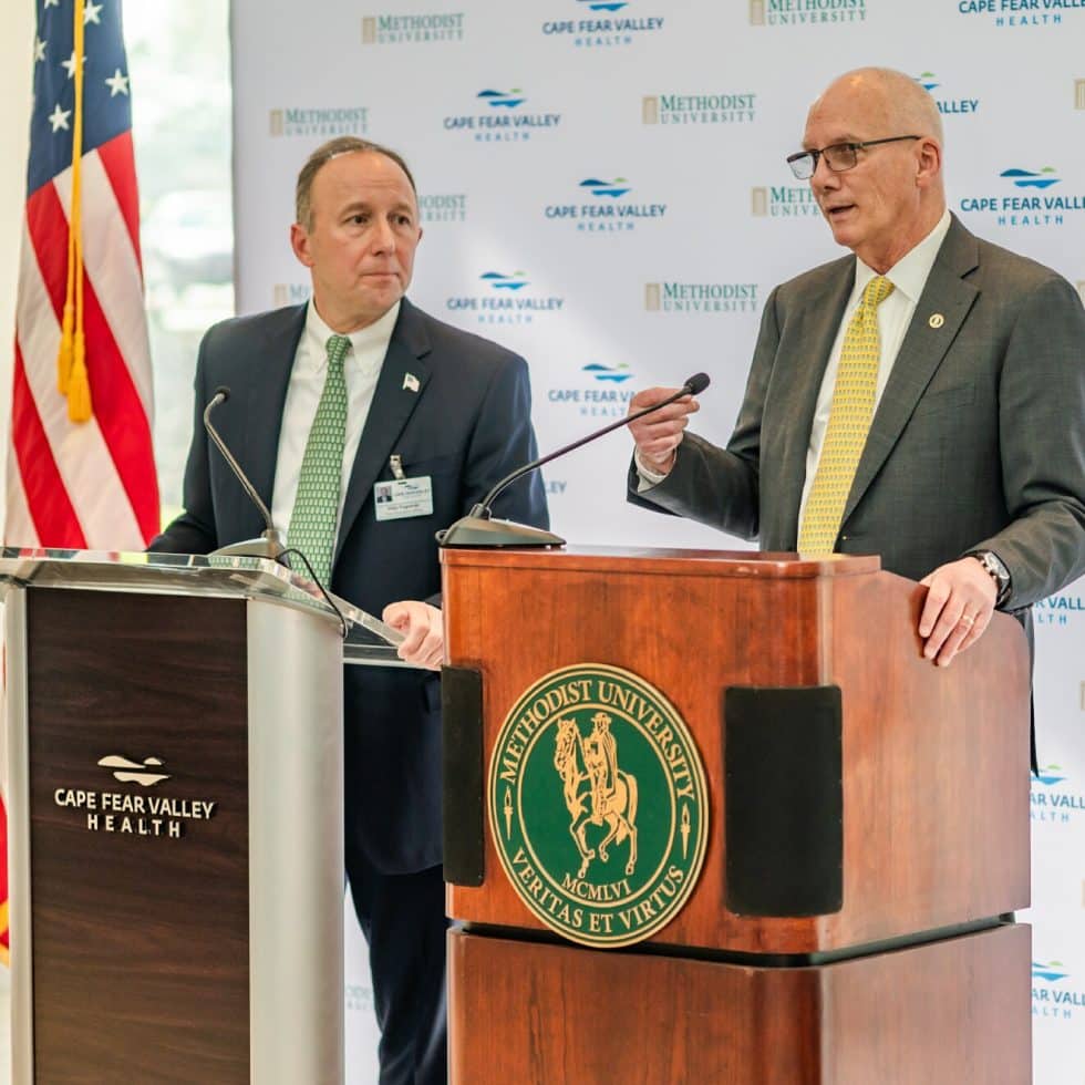 Michael Nagowski, CEO of Cape Fear Valley Health, and Methodist University President Stanley T. Wearden