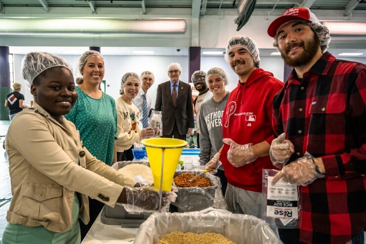 Dr. Wearden and students pack meals