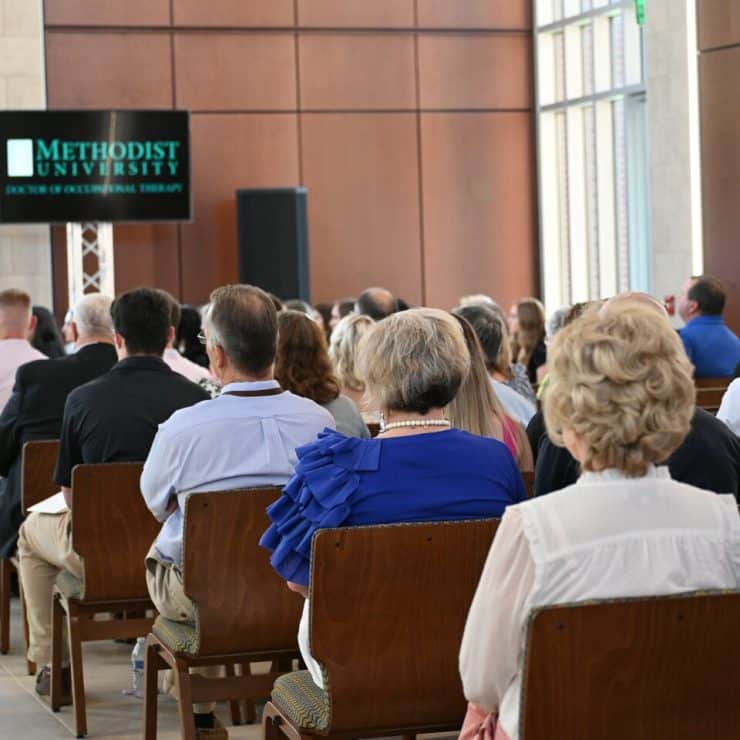 People assembled to witness an Occupational Therapy Pinning Ceremony