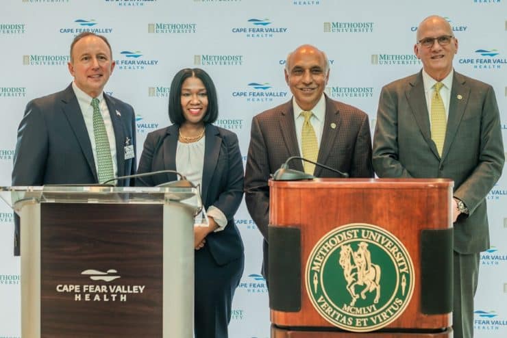 Cape Fear Valley Health CEO Michael Nagowski, Cape Fear Valley Health Board Chair Alicia Marks Flowers, Methodist University Board of Trustees Chair Rakesh Gupta, and Methodist University President Stanley T. Wearden