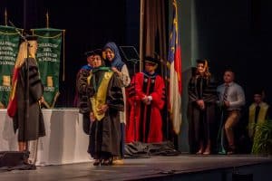 4)Doctor of Physical Therapy graduate Zahra Asif takes part in a hooding ceremony before receiving her doctoral degree on Friday.