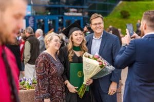 Graduate celebrates with family