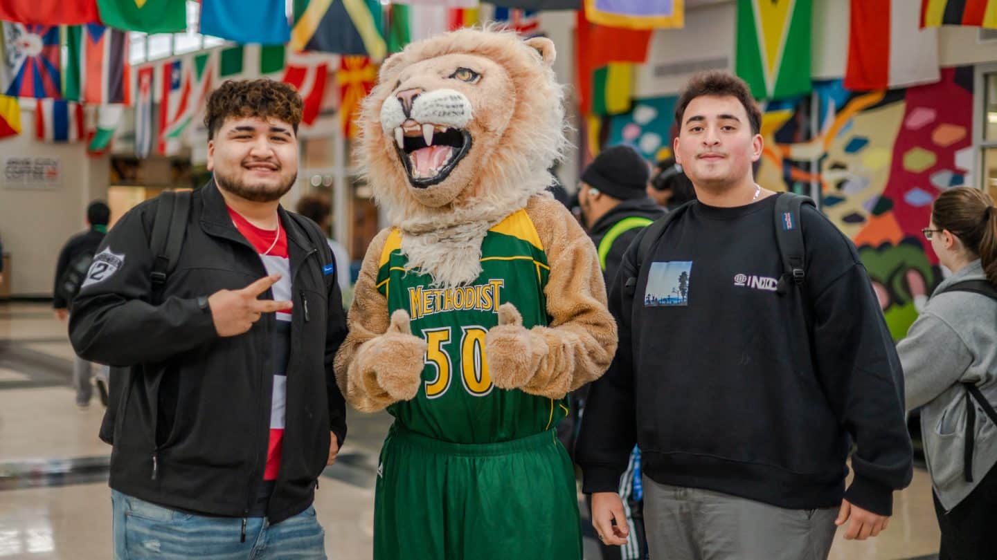 King poses with students in Berns