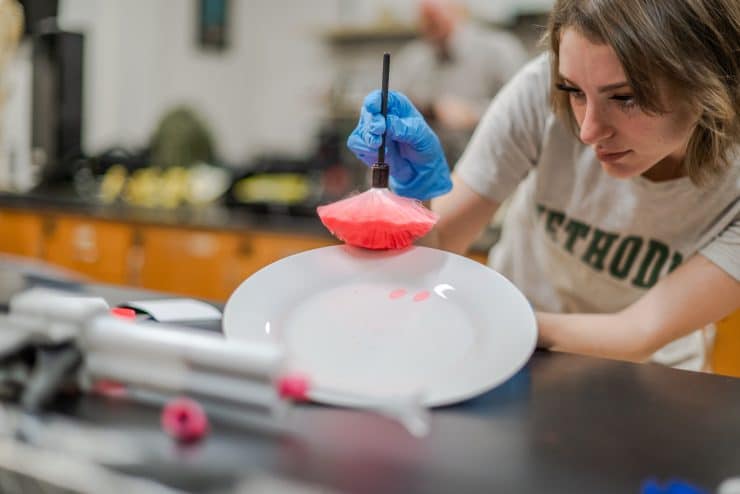 Forensic Science student examines evidence