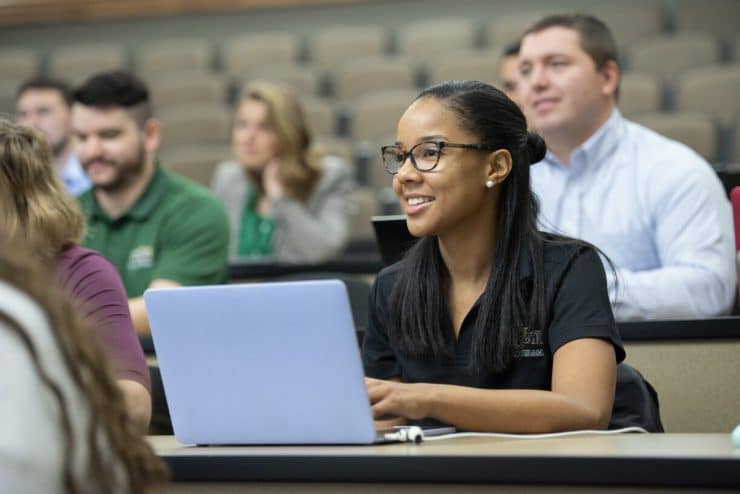 A student listens to a lecture at the Medical Lecture Hall