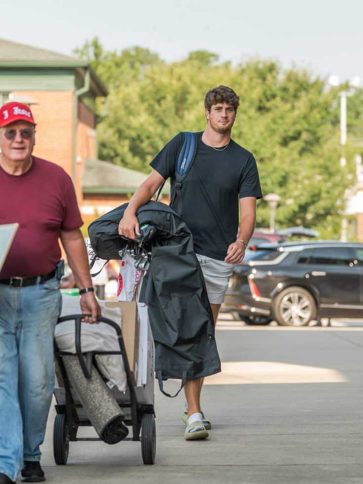 A student arrives on campus