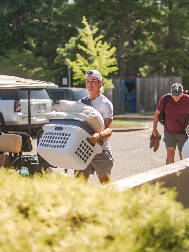 A student arrives on campus
