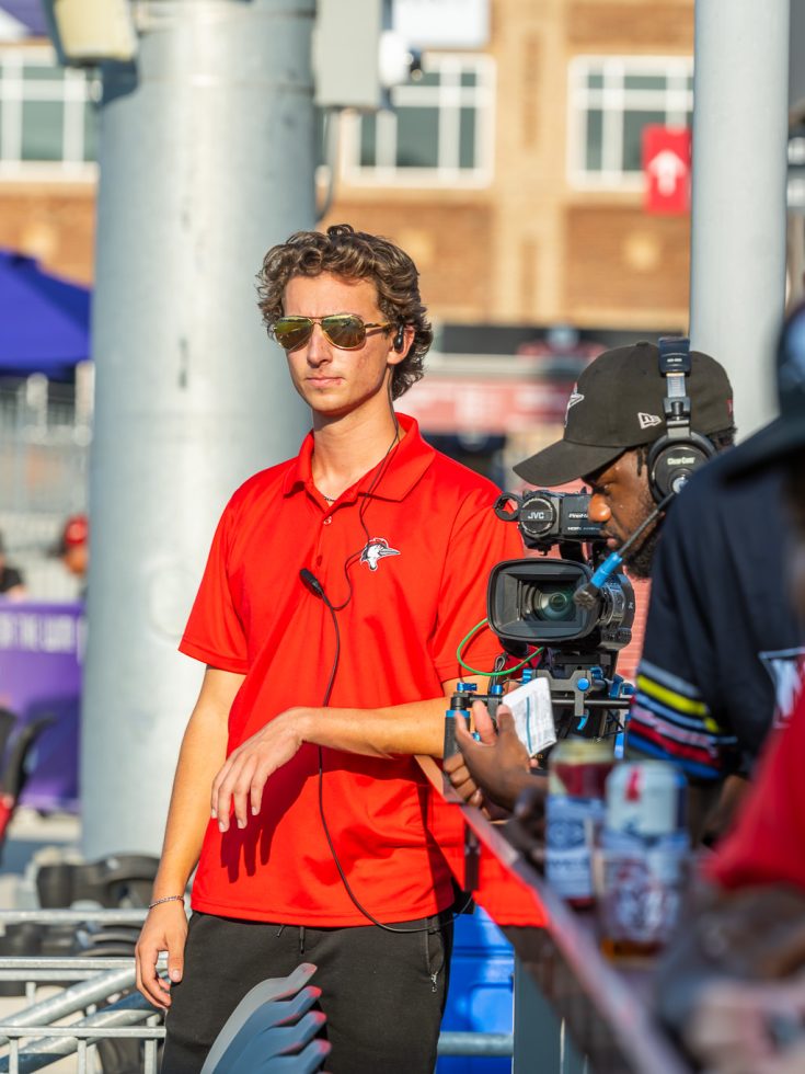 Student interns at a Woodpeckers game