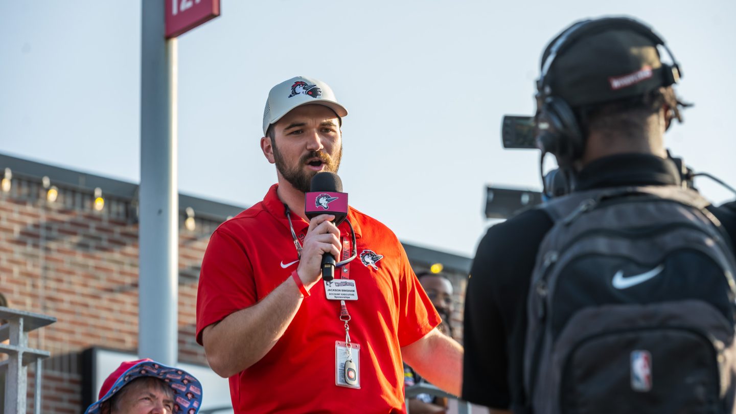 Student interns at a Woodpeckers game