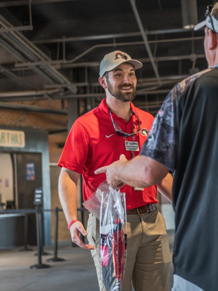 Student interns at a Woodpeckers game