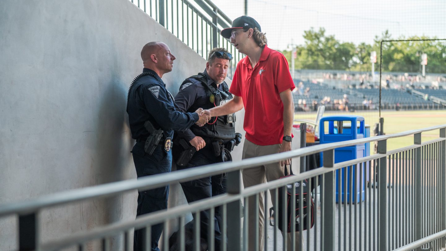 Student interns at a Woodpeckers game